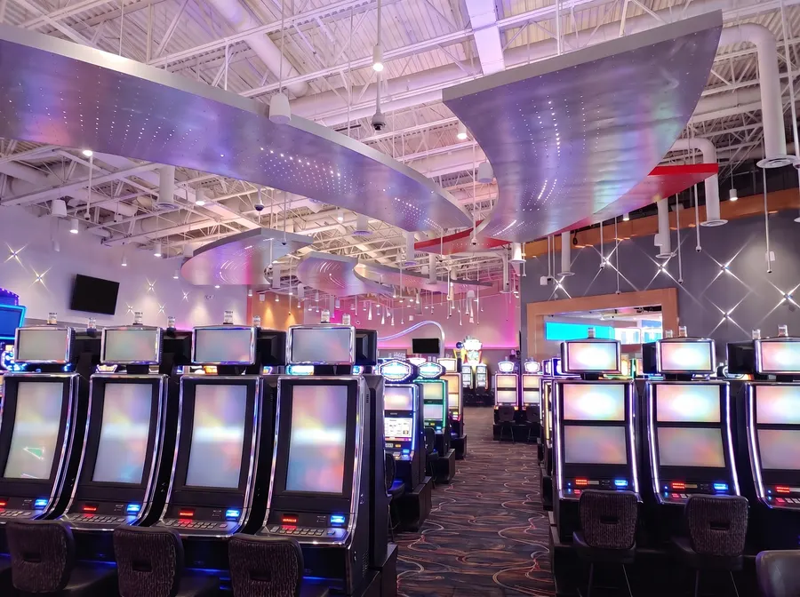 Slot machine aisle under the wave ceiling panels